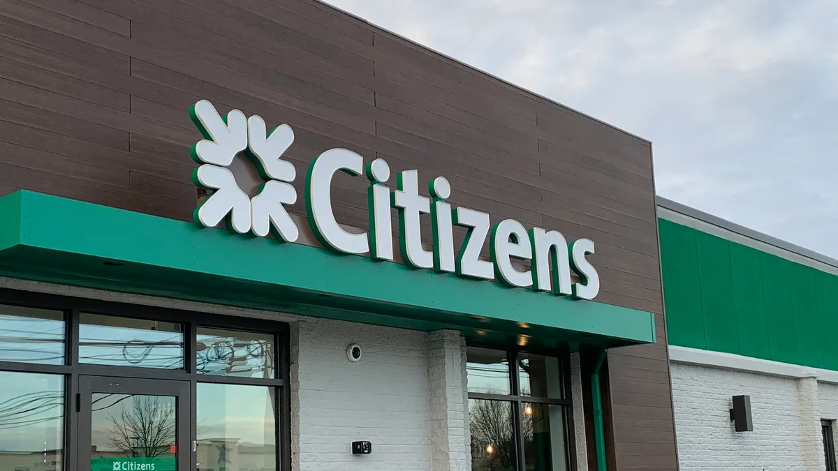 A Citizens Bank branch with a prominent green and white logo on a modern building exterior.
